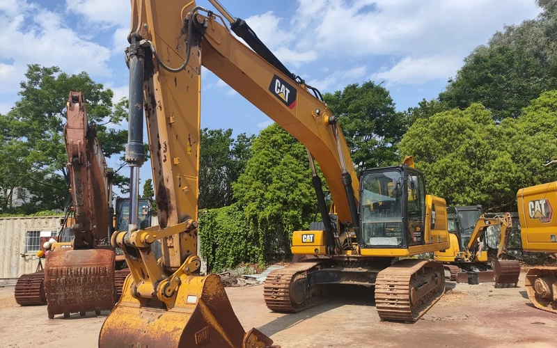 Pelle Cat 330GC à usage intensif