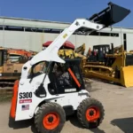 used bobcat s300 mini skid steer loader banner 4