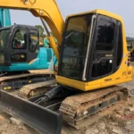 begagnad komatsu pc60 7 grävmaskin i gott skick banner 6 1